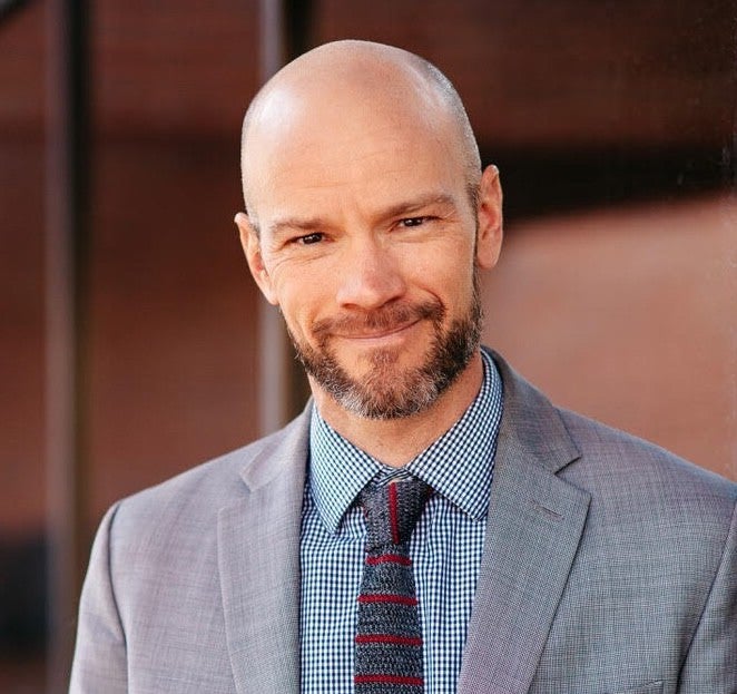 Headshot of Brian Vicente, smiling.