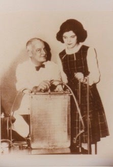 Dr. John Gibbon poses for a photo with former patient Cecelia Bavolek.