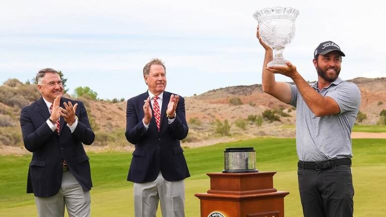 Braden Shattuck (right) lifts the trophy after winning the PGA Professional Championship