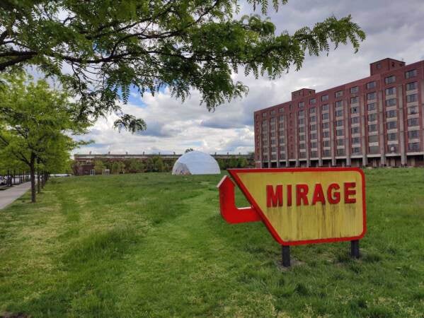 A sign reads mirage. A dome is visible in the background.