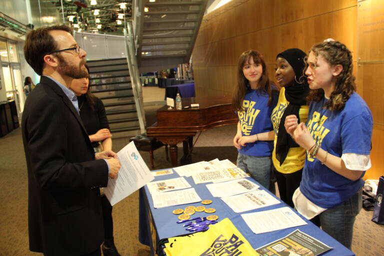 Savannah, Neematallah, and Samantha table at April's City Council At-Large Candidate Convention