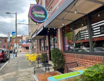 South Philly restaurant Juana Tamale was penalized by the city for its sign that is 8 inches larger than what officials said was allowed under zoning law.
(Kristen Mosbrucker/ WHYY News)