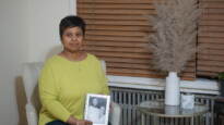 Tamika Morales holds a photo of herself and her son, Ahmad Morales.