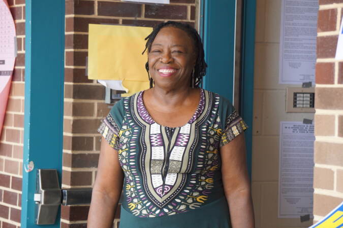 Andrea Clark standing outside of her polling place.