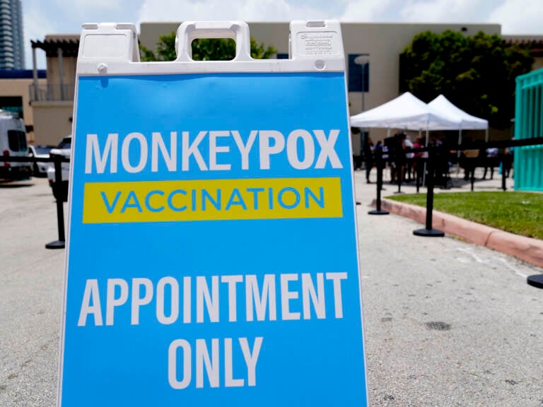 A sign for monkeypox vaccinations is shown at a vaccination site in Miami Beach