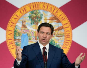 Florida Gov. Ron DeSantis speaks during a news conference to sign several bills related to public education and increases in teacher pay, in Miami, Tuesday, May 9, 2023. DeSantis and former President Donald Trump will share the spotlight in Iowa on Saturday, May 13, providing a chance to sway influential conservative activists and contrast their campaign styles in Republicans' leadoff voting state. (AP Photo/Rebecca Blackwell)