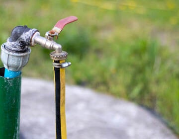 a pump connected to a water well.
