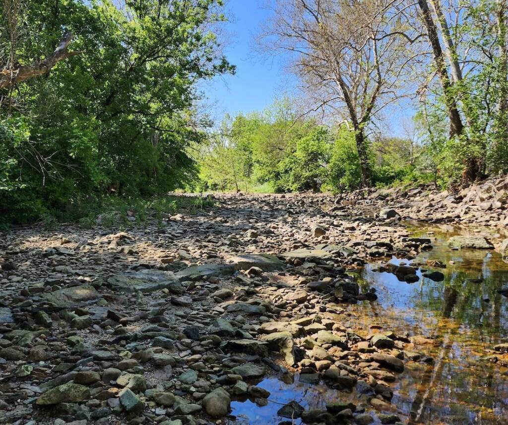 Bushkill Creek is visible on a sunny day.