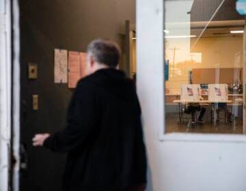 Man enters polling place.