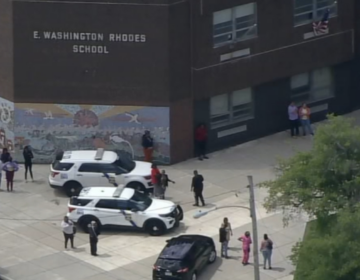 Police cars outside of E.W. Rhodes Elementary School