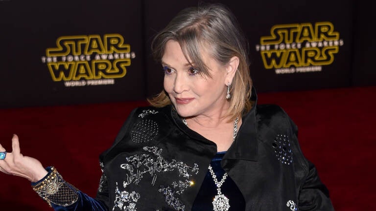 Actress Carrie Fisher attends the premiere of Star Wars: The Force Awakens at the Dolby Theatre in Hollywood on Dec. 14, 2015. The late actress is being honored with a star on the Hollywood Walk of Fame on Thursday.