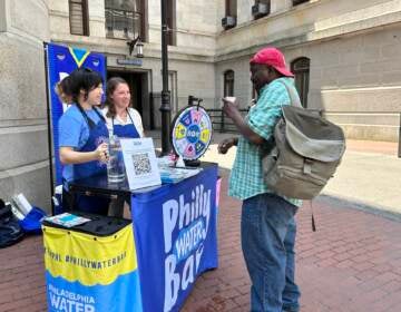 Philadelphians sample tap water at a PWD water bar event