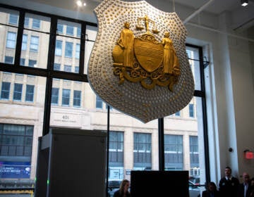 A sculpture by artist Donald Lipski made of 1,400 Philadelphia police badges in the lobby of police HQ in the Philadelphia Public Safety Building, called ''Let Love Endure.''