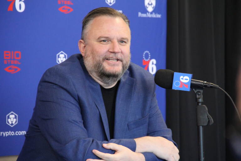 Daryl Morey talks into a microphone at a press conference.