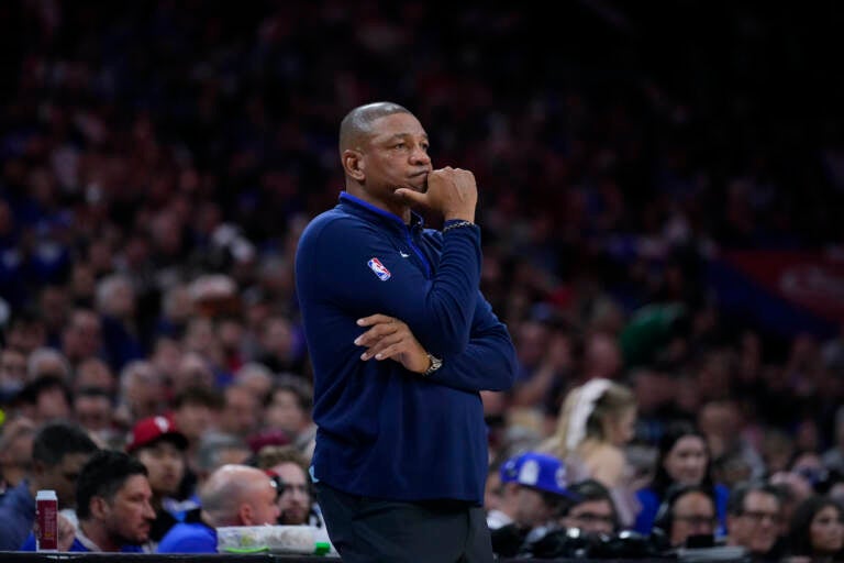 Doc Rivers standing on the sideline during a game.