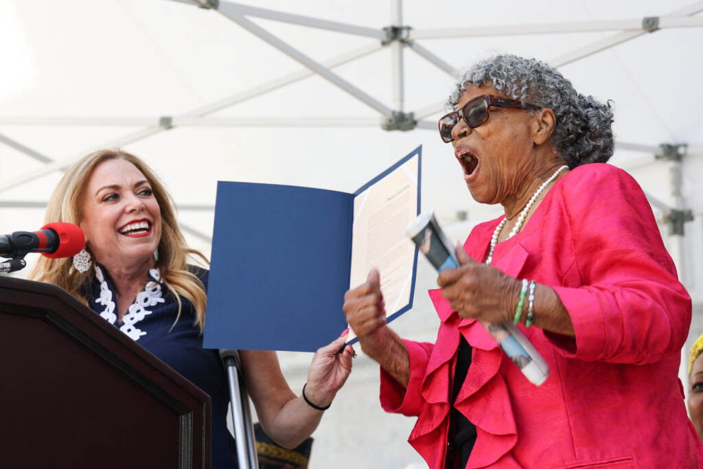 Opal Lee receiving a proclamation on stage