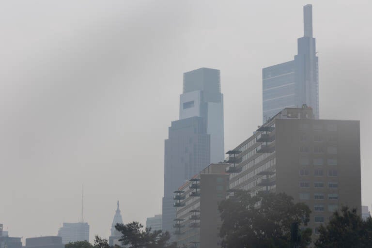 Philadelphia skyline hazy from smoke.