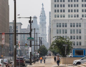 Busy Center City street with City Hall in the background