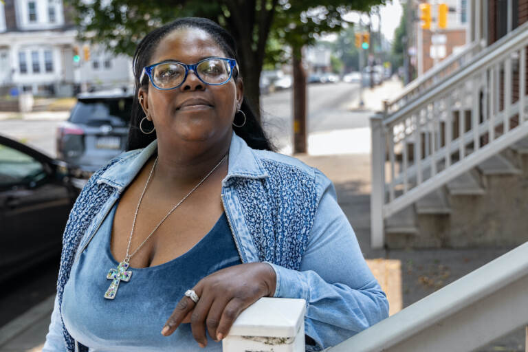 Sheila Armstrong standing on the street.