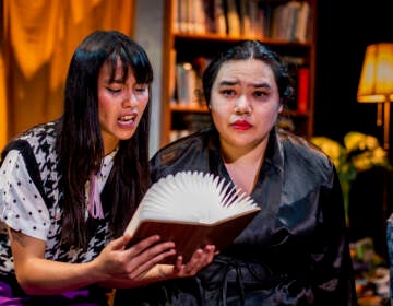 The book store manager in the play speaks with the author, Murasaki Shikibu.