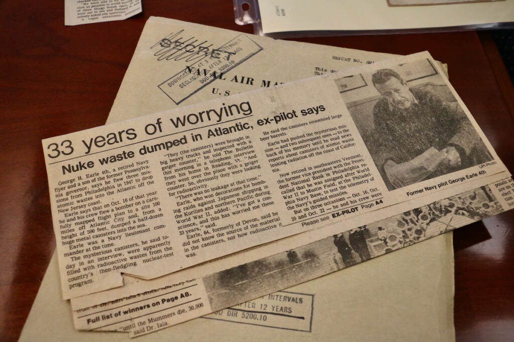 A newspaper clipping records the regrets of a retired Navy pilot who flew three missions to drop atomic wastes into the Atlantic Ocean off the New Jersey coast. (Emma Lee/WHYY)