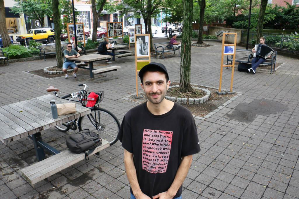 A view from above of Rami George posing in Louis Kahn Park.