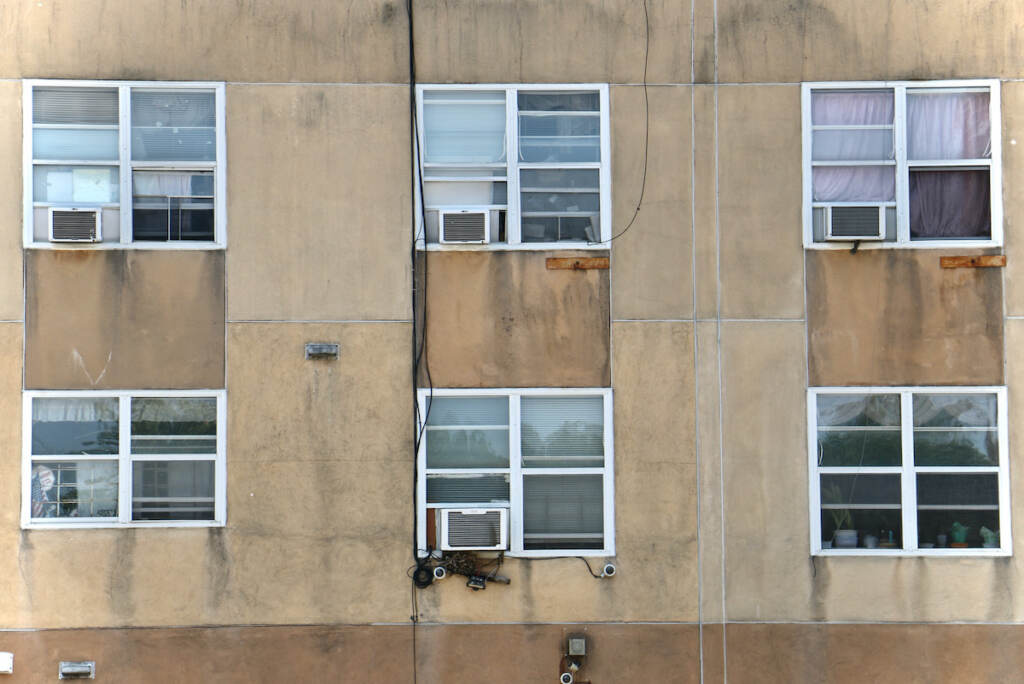 Window air conditioners in an building on Race Street