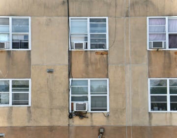 Window air conditioners in an building on Race Street