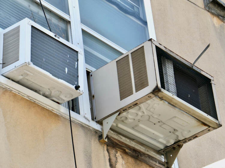 Window air conditioners in an building on Race Street