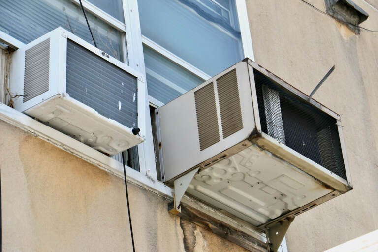 Window air conditioners in an building on Race Street