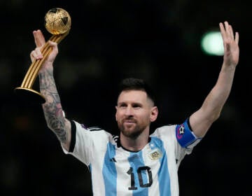 File photo: Argentina's Lionel Messi waves after receiving the Golden Ball award for best player of the tournament at the end of the World Cup final soccer match between Argentina and France at the Lusail Stadium in Lusail, Qatar, Sunday, Dec. 18, 2022. Lionel Messi says he is coming to Inter Miami and joining Major League Soccer. After months of speculation, Messi announced his decision Wednesday, June 7, 2023,to join a Miami franchise that has been led by another global soccer icon in David Beckham since its inception but has yet to make any real splashes on the field