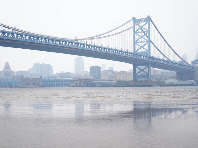The Benjamin Franklin Bridge and the Philadelphia skyline are shrouded in haze, Wednesday, June 7, 2023. Intense Canadian wildfires are blanketing the northeastern U.S. in a dystopian haze, turning the air acrid, the sky yellowish gray and prompting warnings for vulnerable populations to stay inside.