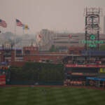 Detroit Tigers' players walk through the outfield at Citizens Bank Park after poor air quality postponed their baseball game against the Philadelphia Phillies, Wednesday, June 7, 2023, in Philadelphia