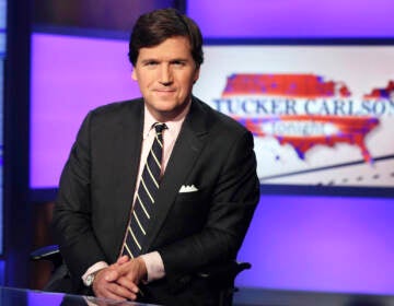 File photo: Tucker Carlson, host of ''Tucker Carlson Tonight,'' poses for photos in a Fox News Channel studio on March 2, 2017, in New York