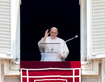 Pope Francis delivers his blessing as he recites the Angelus noon prayer from the window of his studio overlooking St.Peter's Square, at the Vatican, Sunday, June 18, 2023