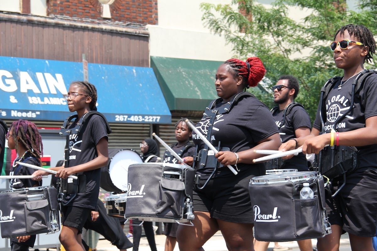 Marching bands drummed their way down 52nd Street, providing a rhythm that kept the crowd going