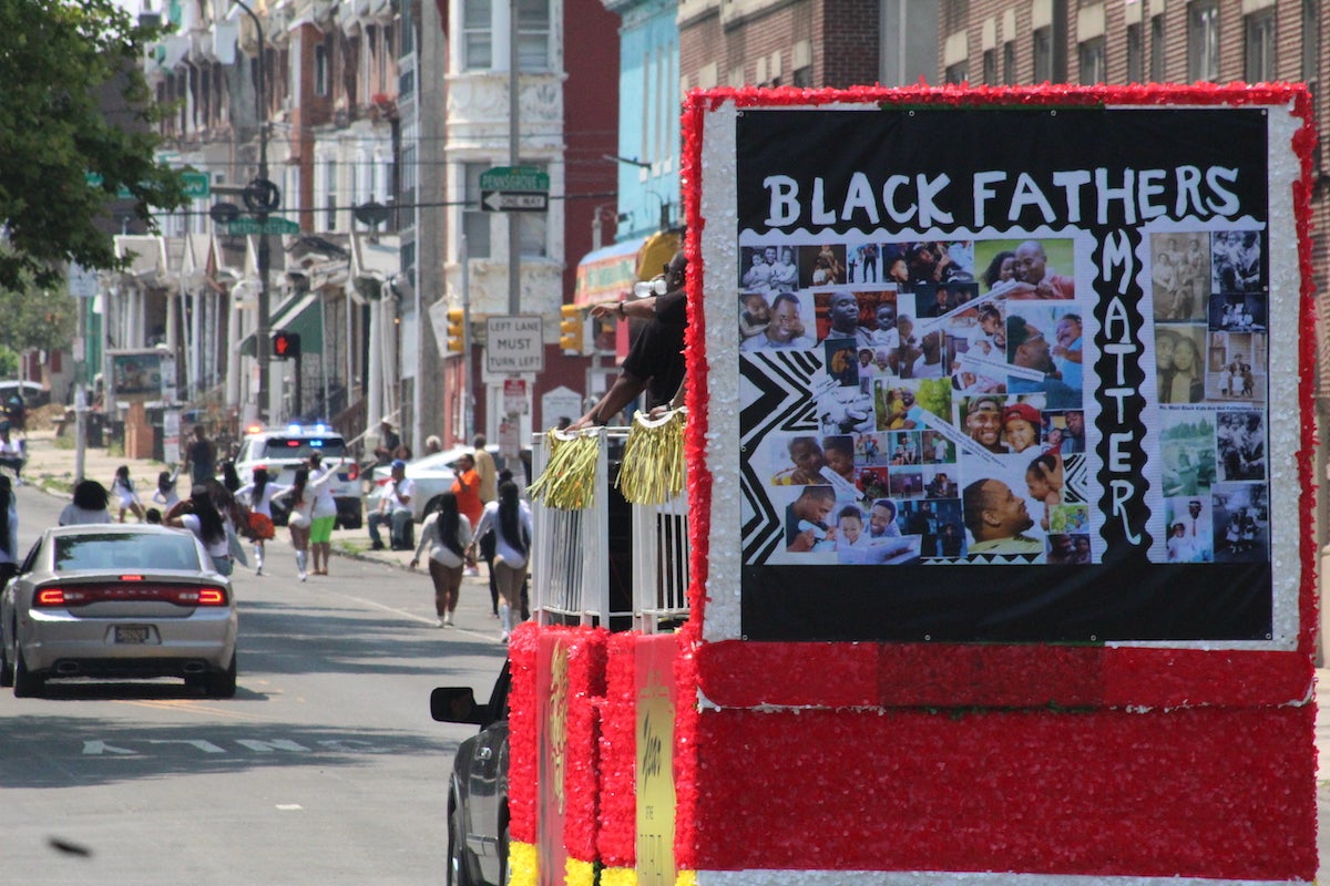 The festival took place on Father's Day, and this float was themed on the importance of a strong father figure in the family unit