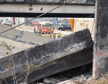 Crews work to remove rubble from a collapsed section of I-95 on June 11, 2023, after a vehicle fire caused an overpass to collapse near Cottman Avenue on I-95.