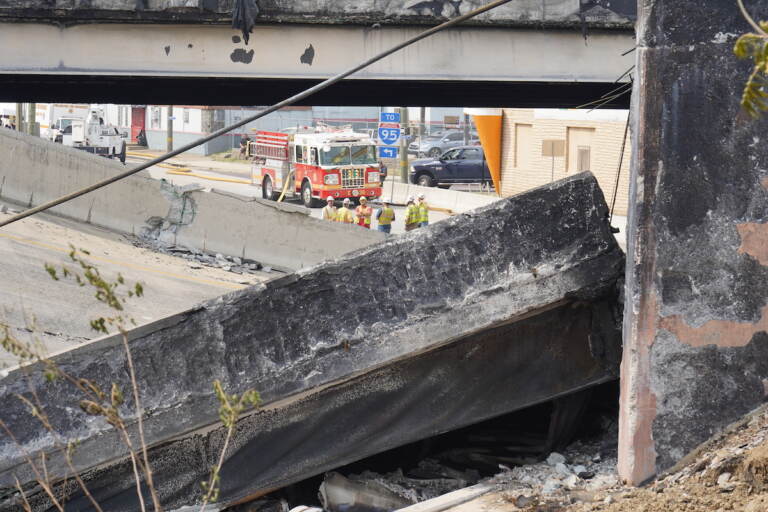Crews work to remove rubble from a collapsed section of I-95 on June 11, 2023, after a vehicle fire caused an overpass to collapse near Cottman Avenue on I-95.