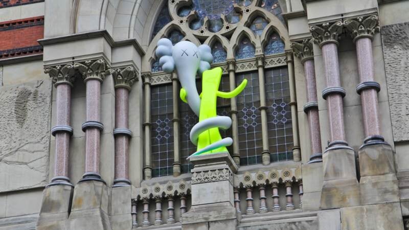 Born to Bend, a 9-foot sculpture by artist KAWS, was installed at PAFA on Tuesday. (Kimberly Paynter/WHYY)