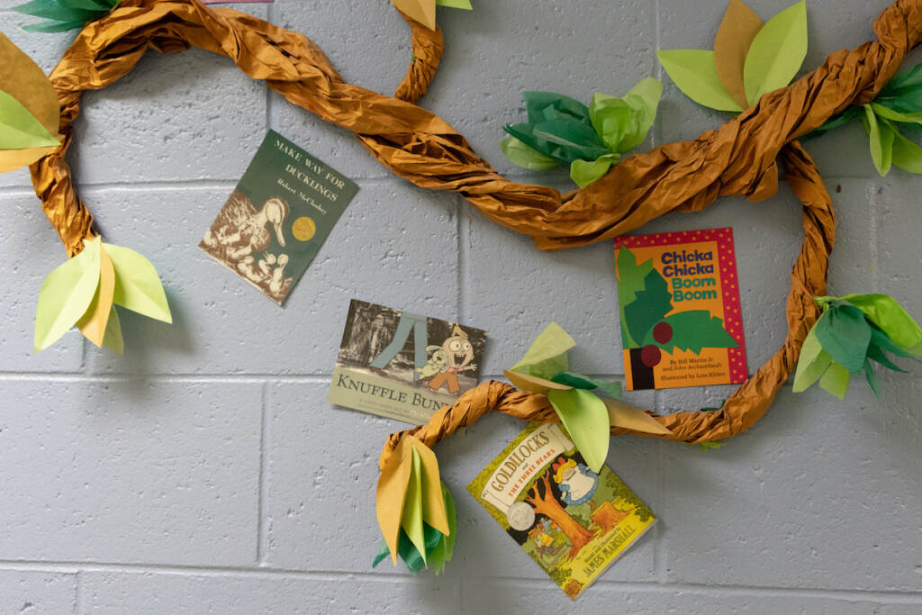 Craft paper trees and flowers on the wall