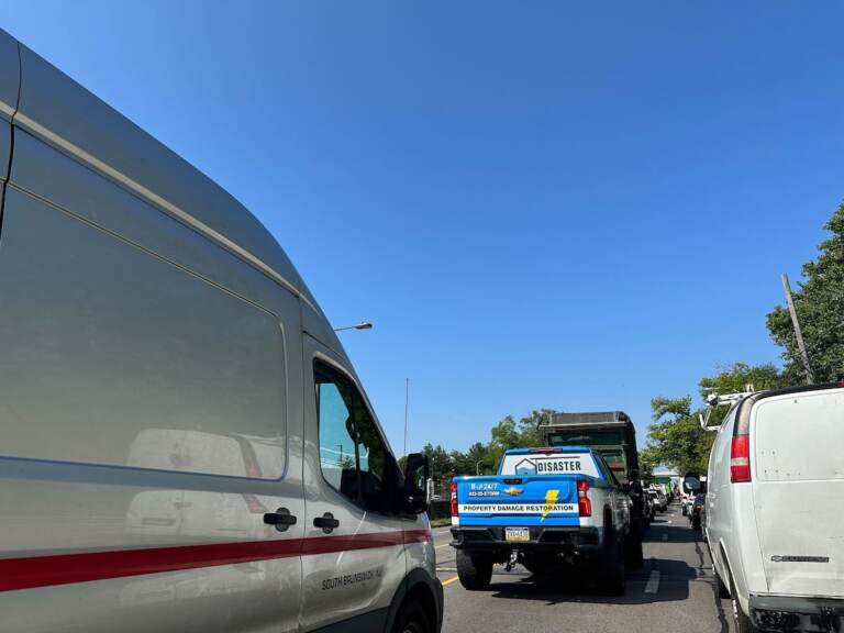 A line of cars and trucks