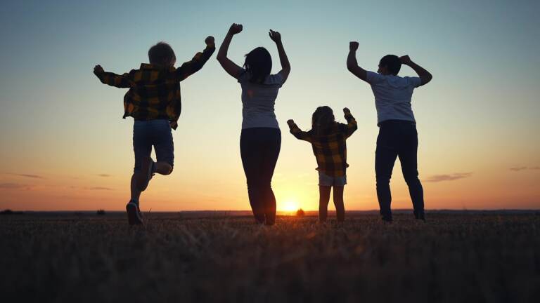 friendly family jumping rejoice. silhouette a happy family bouncing with happiness after victory in nature sunset. happy family kid dream freedom concept. big family happy freedom in nature lifestyle