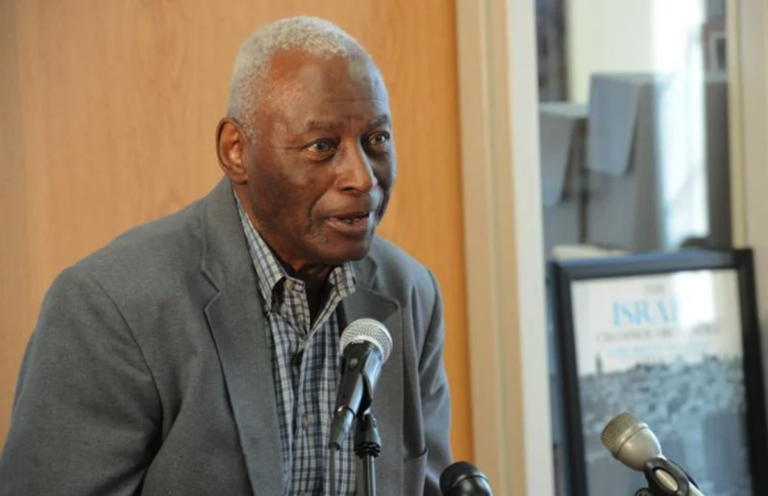 Charles L. Blockson speaking at a podium