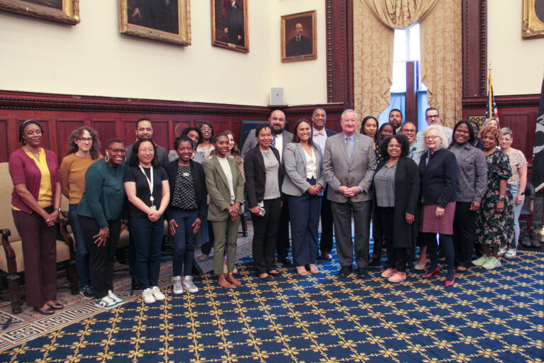 Mayor Kenney posing for a group photo with other city leaders.