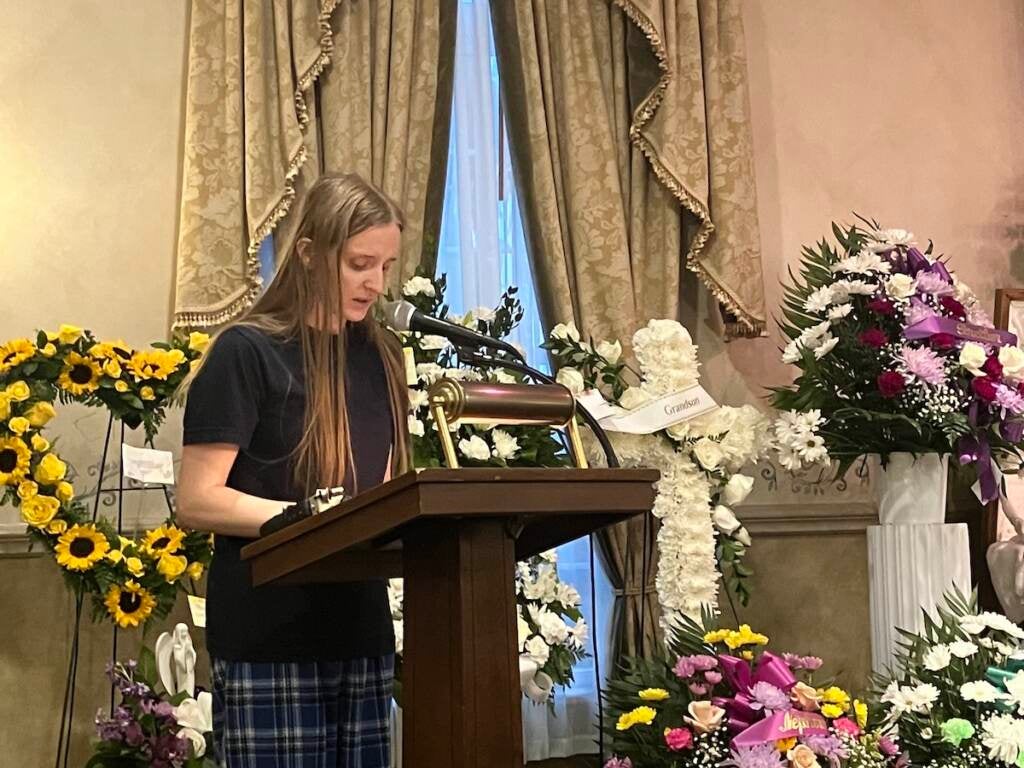 Jessica Skladanowski speaks at a podium.