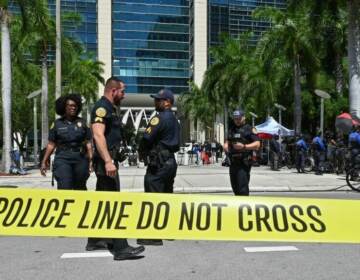 Police officers are pictured outside the Wilkie D. Ferguson Jr. United States Courthouse before the arraignment of former President Donald Trump in Miami on Tuesday