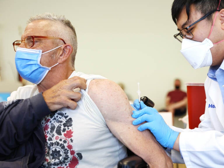 Man getting a vaccination shot.