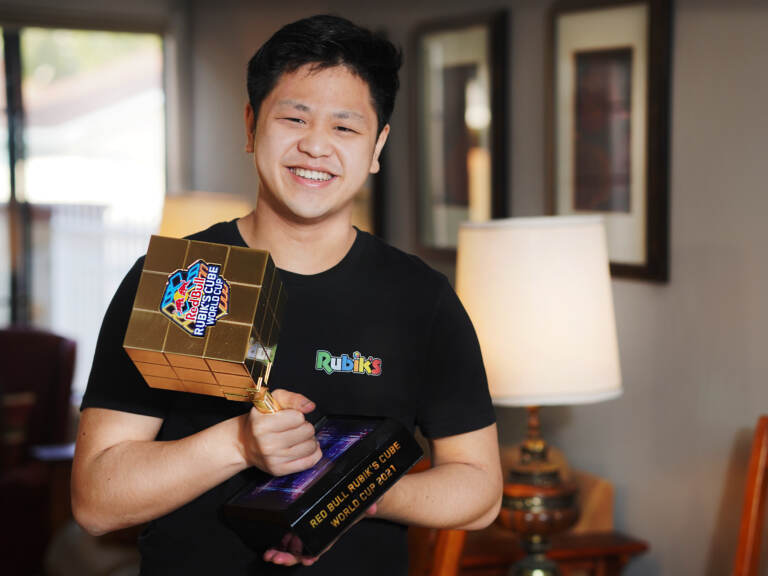 Max Park, pictured after winning a December 2021 competition, recently set a world record for solving a 3x3x3 Rubik's cube in 3.13 seconds.