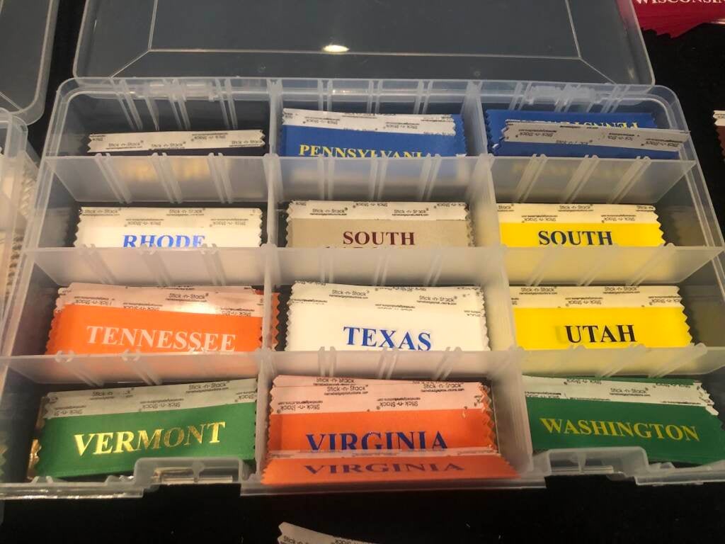 Nametags are displayed on a table